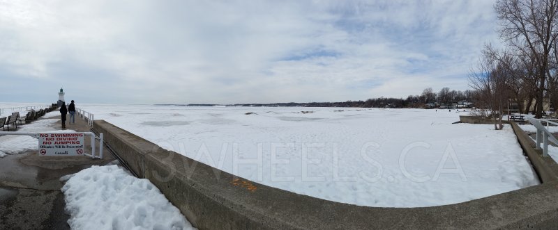 Still snow and ice in the lake and on the beach